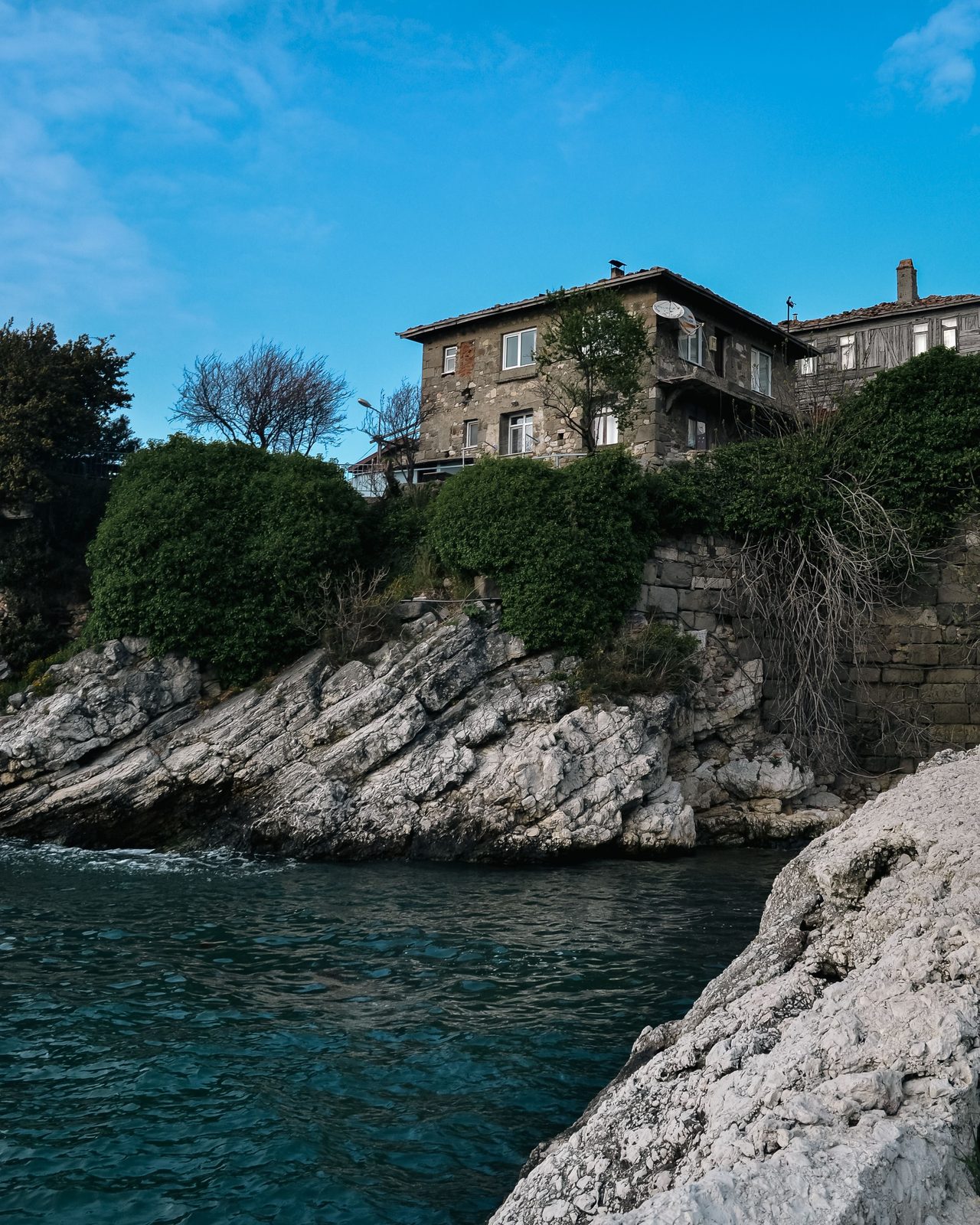 Stone house above the water